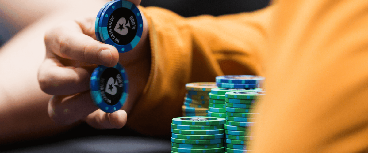 Shuffling blue poker chips