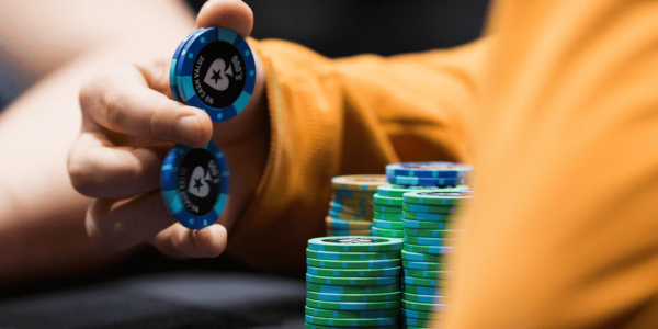 Shuffling blue poker chips